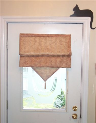 Roman shade on door
